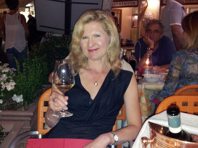 njoying vino at an outdoor Cafe in Stresa