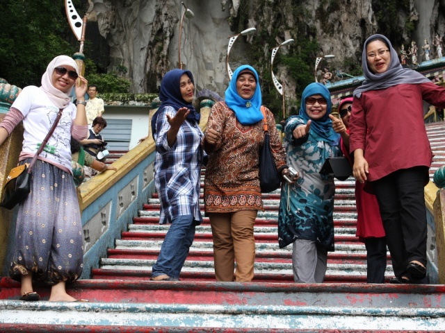 Along steps up to Batu Caves, some Indonesian visitors 